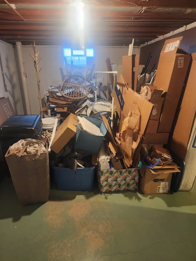 Roll-off dumpster container at job site for 2 Yard Dumpster Rental in Cheraw